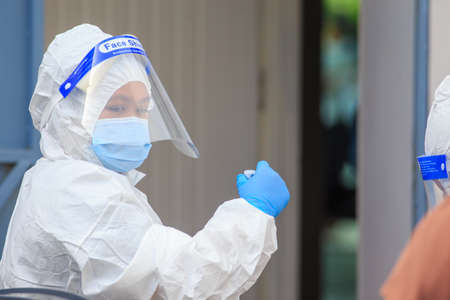 Alor Setar, Kedah, Malaysia - May 20, 2021 : Private clinic make a Swab test in  to local citizen...