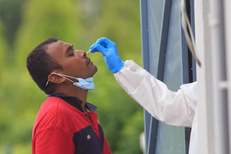 Alor Setar, Kedah, Malaysia - May 20, 2021 : Private clinic make a Swab test in  to local citizen...