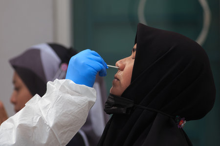 Alor Setar, Kedah, Malaysia - May 20, 2021 : Private clinic make a Swab test in  to local citizen...