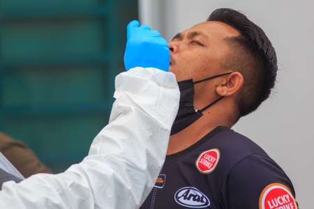 Alor Setar, Kedah, Malaysia - May 20, 2021 : Private clinic make a Swab test in  to local citizen...