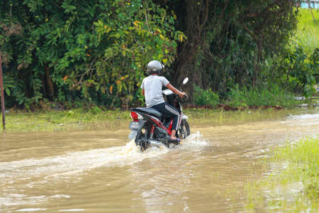 Kedah Malaysia- Circa November 2021:flood conditions that hit around malaysia during the monsoon season. many houses were inundated by floods, the situation worsened when it rained for 4 daysのeditorial素材
