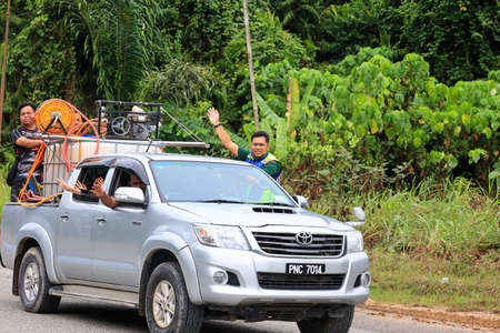 Pahang, Malaysia: January 1, 2022: A group of volunteers help clean the houses of residents affected by the worst floods to hit Malaysia in December 2021のeditorial素材