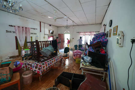 people are seen inside a house in the city of Salvador.の写真素材