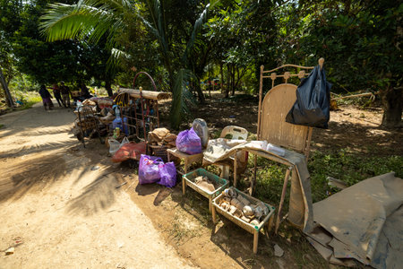Baling ,Kedah - July 09,2022 : Clean Up Day in Baling,Kedah after aftermath of Baling hit by 'worst ever' floods . Volunteers help clean up flooded areas in Balingのeditorial素材