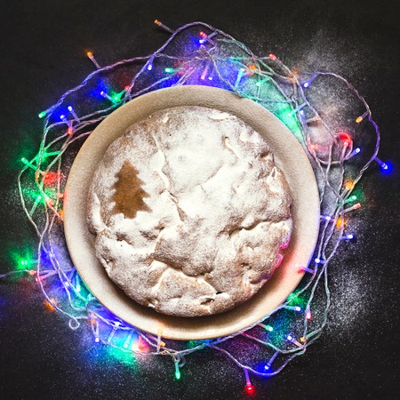 Apple pie with Christmas decorations on dark grey backgroundの写真素材