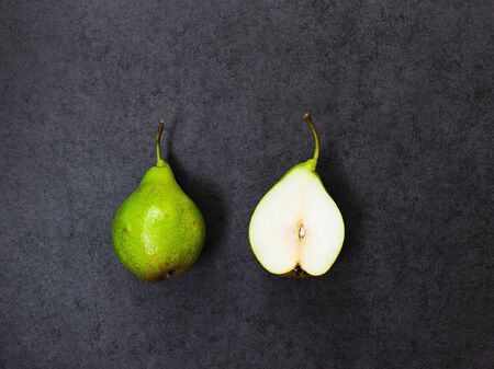 Two pears on a gray stone backgroundの写真素材