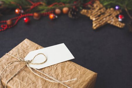 Vintage gift box with Christmas decorations, shot at angleの写真素材