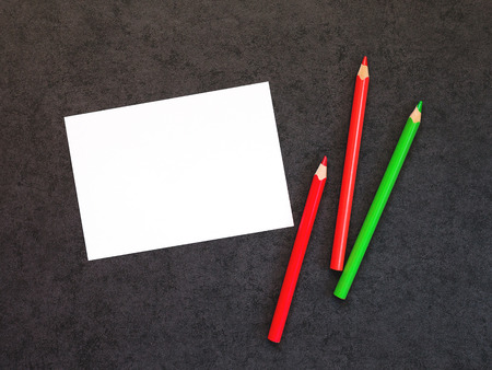 Background with white card and tree pencilsの写真素材