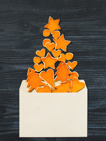 Christmas mock up with envelope and decorative new year treeの写真素材