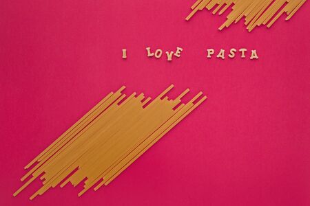 Words I Love Pasta on pink backgroundの写真素材