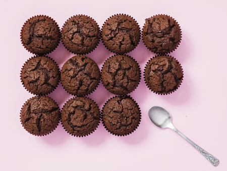 Brownie with silver tea spoon on pink backgroundの写真素材