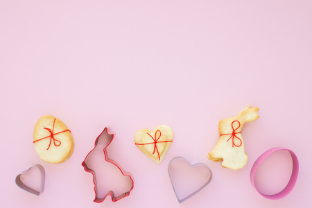 Set of cookies and forms for its on pink backgroundの写真素材