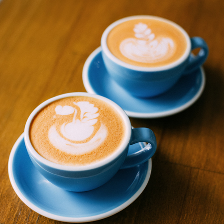 Two cups with cappuccino.の写真素材