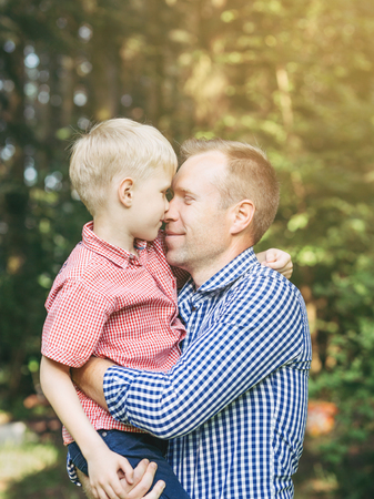Embrace of father and little son.の写真素材
