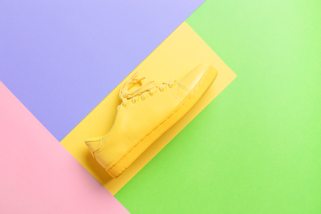 Conceptual image with yellow shoe.の写真素材