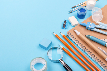 School stationary on blue background.の写真素材