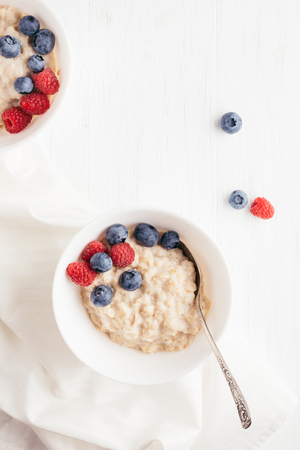 Oatmeal porridge with berries.の写真素材