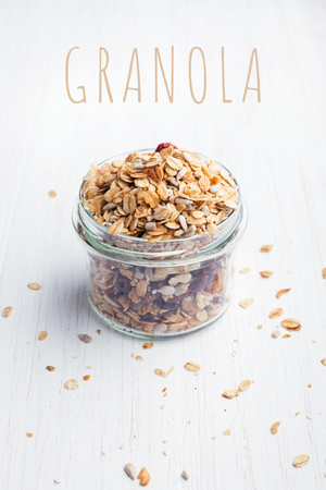 Granola in jar on the table.の写真素材