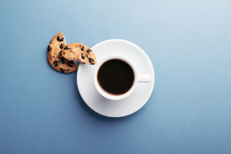 A cup of coffee and cookies.の写真素材