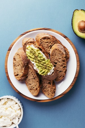 Fresh french chopped baguette and avocado.の写真素材