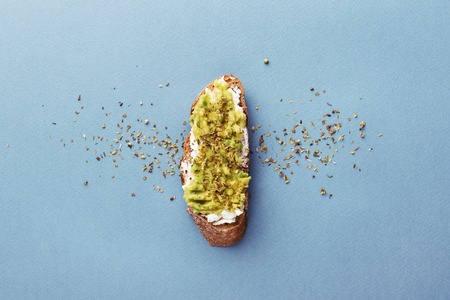 Bruschetta with cream cheese and avocado.の写真素材