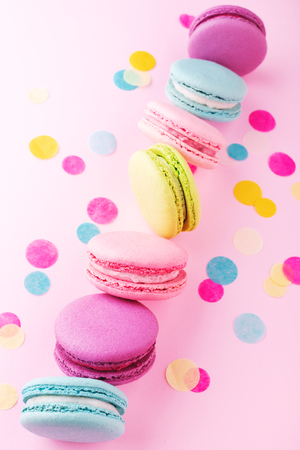 The diagonal row of colorful macarons.の写真素材