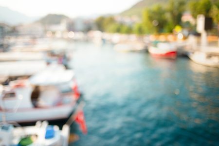Blurred view on yachts in the bay. Sunrise in yacht dock.の写真素材