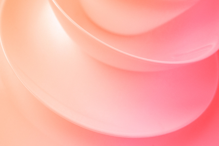 Abstract background with smooth lines in coral color. Living coral color of the Year 2019.の写真素材