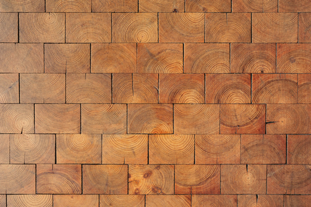 Natural wooden floor texture. Cross cut lumber blocks, top view.の写真素材