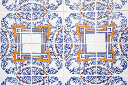 Traditional ornate portuguese decorative tiles azulejos in white, brown and blue colours.の写真素材