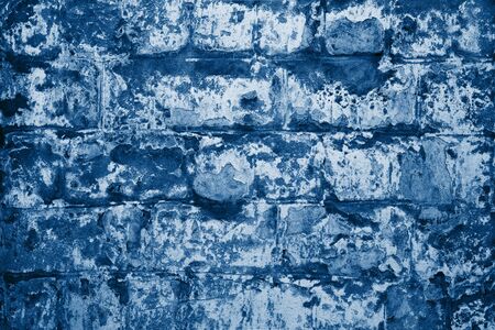 Texture of old painted in blue brick wall.の写真素材