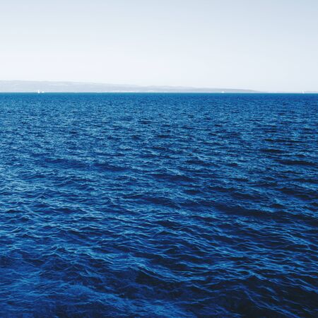 Blue sea surface aerial view. Ocean texture.の写真素材