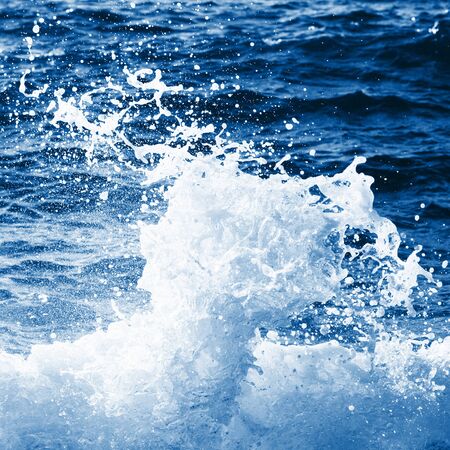 View on blue ocean waves and foam.の写真素材