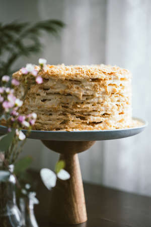 Homemade multilayers cake Napoleon on the cake stand.