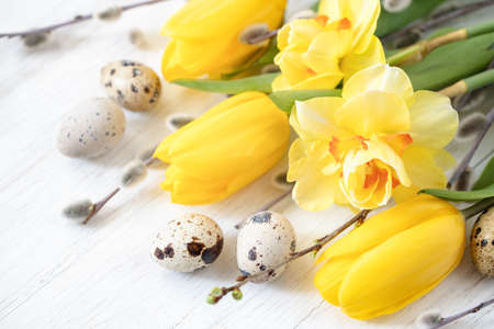 Easter card with flowers and eggs.