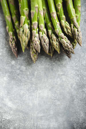Fresh asparagus on gray table.の写真素材