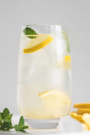 Glass of lemonade or lemon water with mint.の写真素材