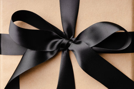 Close up view on tied black bow.の写真素材