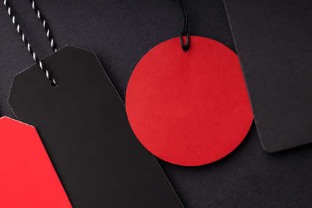 Closeup view on price tags on black background.の写真素材