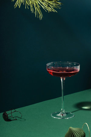 Red champagne in retro glass wine with decorations.の写真素材