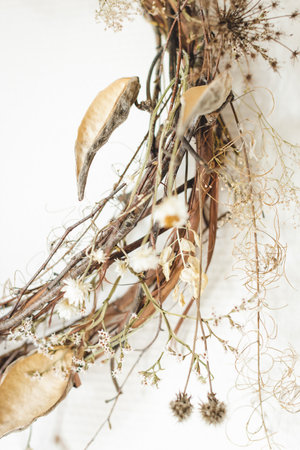 Close up of interior wreath made of dry flowers and herbs.の写真素材