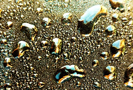 Background of Bubbles of Melting goldの写真素材