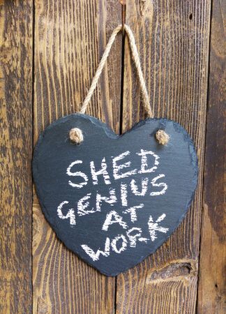 Shed genius at work signの写真素材