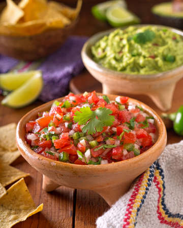 A delicious home made salsa pico de gallo with tomato, onion, lime, cilantro, and jalapeno pepper.の写真素材
