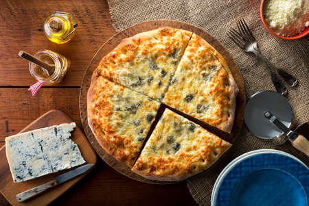 A delicious home made gourmet pizza with gorgonzola blue cheese.の写真素材
