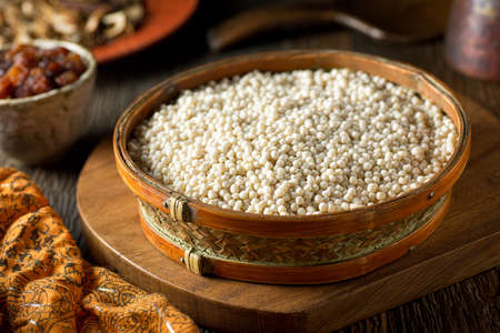 A bowl of raw organic Israeli couscous.の写真素材