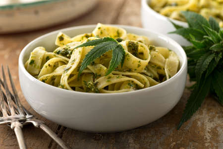 A bowl of delicious pasta with homemade marijuana pesto.の写真素材
