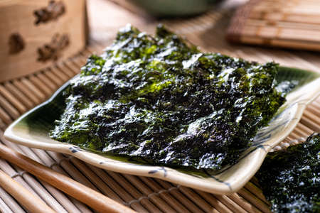 Delicious toasted seaweed and sesame snacks.の写真素材