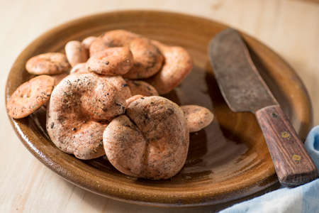delicious fresh and freshly picked orange mushrooms in the pine forestの写真素材