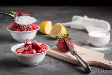 Delicious seasonal red strawberries, in preparation to be made and tasted. Very rich and healthy foodの写真素材